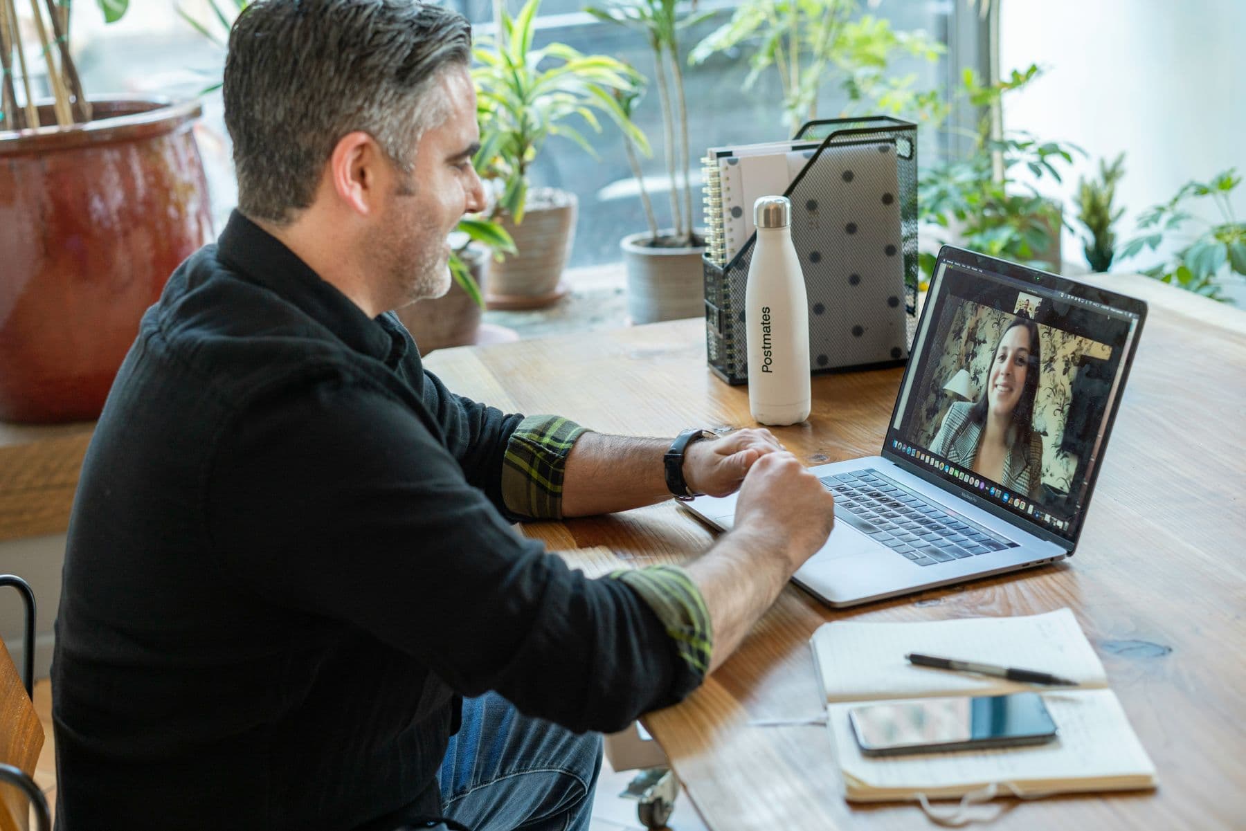 A tutor teaching an online lesson over a video call